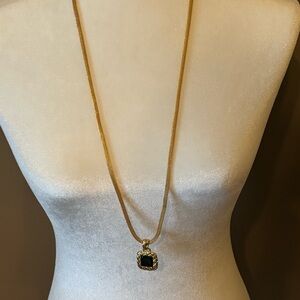 LCI Long Gold tone pendant necklace